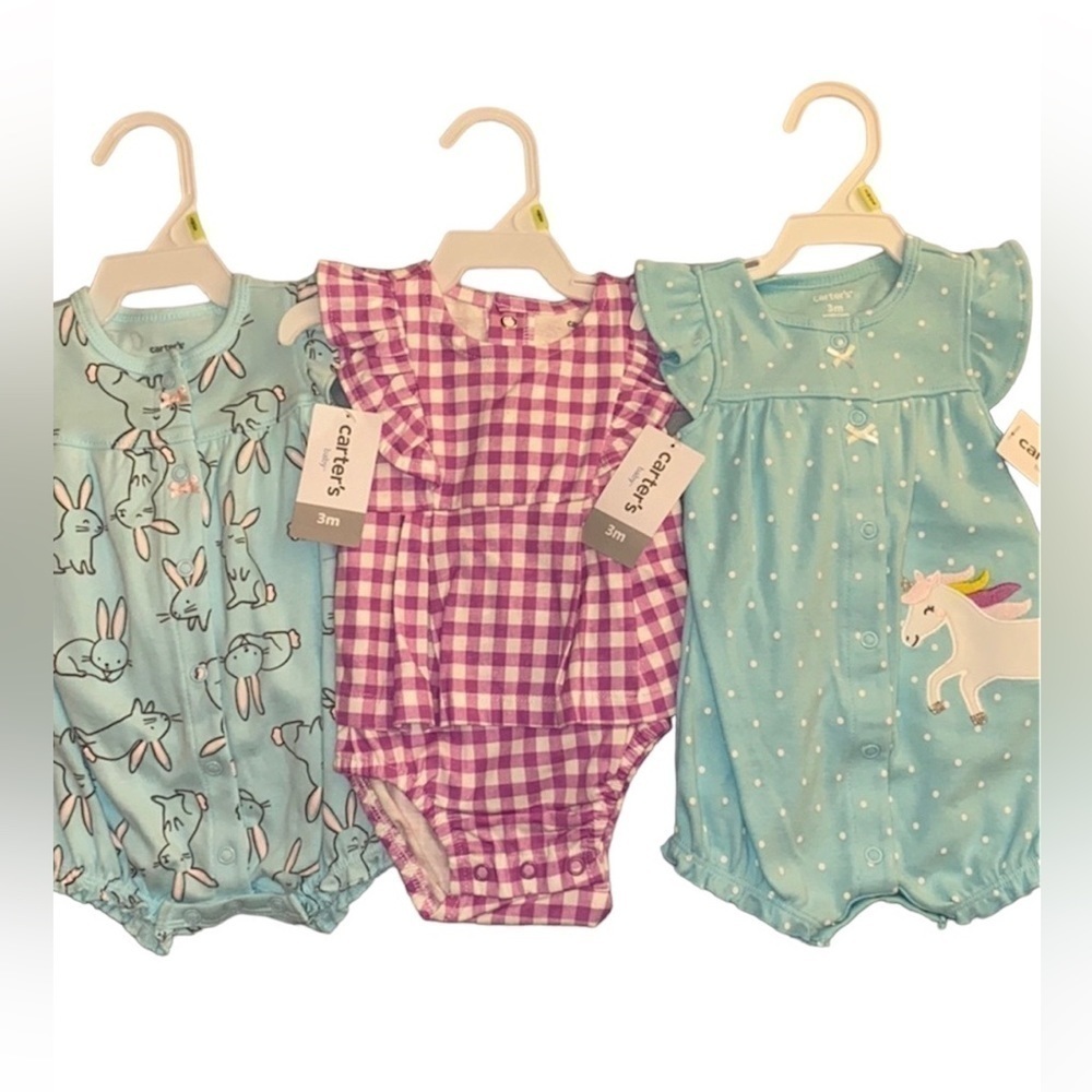 Carterās NWTā lot of rompers size 3 months